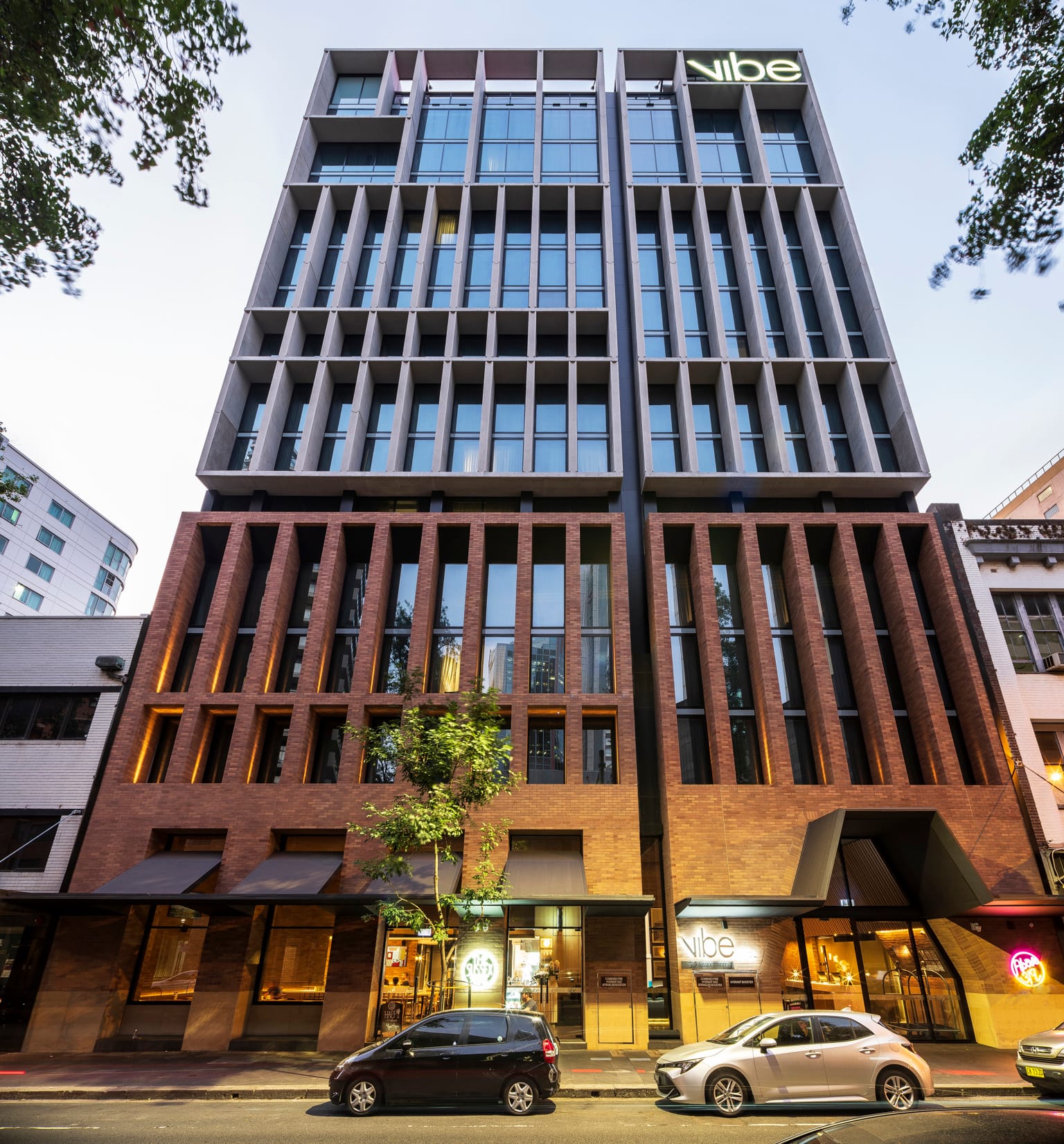 Vibe Hotel - Exterior twilight view